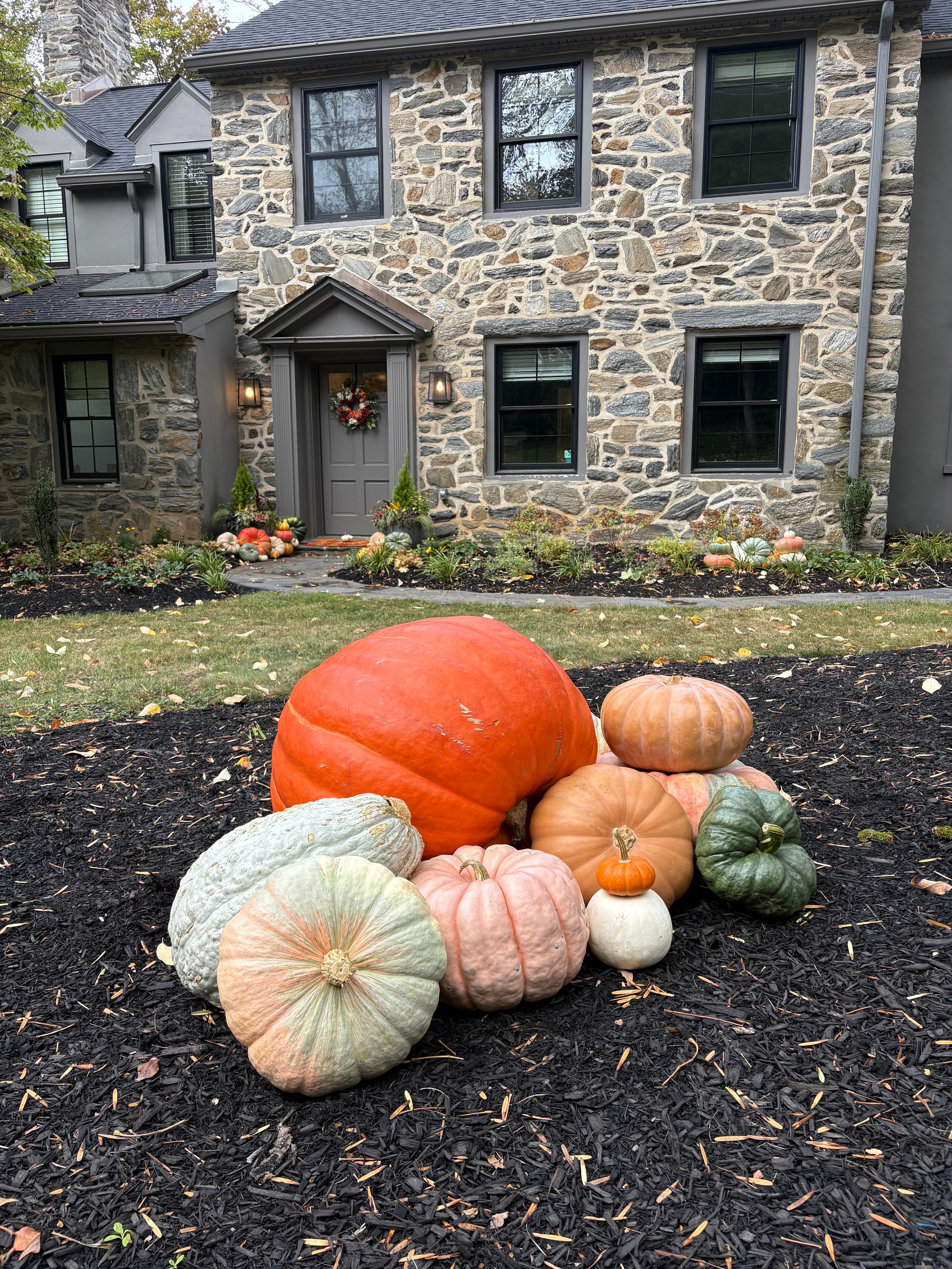 Fall porch with pumpkins and gourds